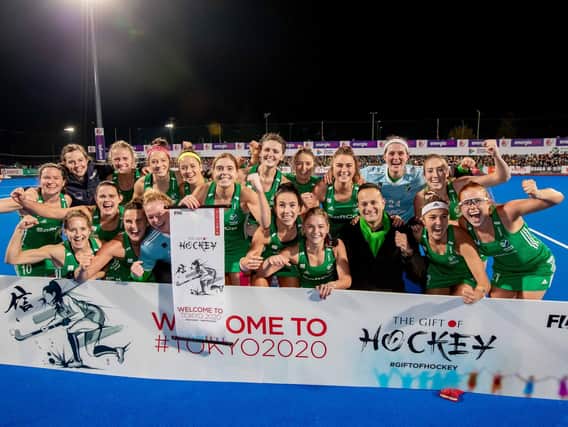 The Irish players celebrate reaching the Olympic Games