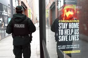 A policeman pictured in Belfast city centre. Some PSNI officers have simply made up – and then enforced – their own law