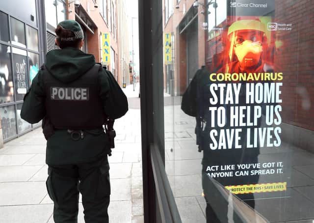 A policeman pictured in Belfast city centre. Some PSNI officers have simply made up – and then enforced – their own law