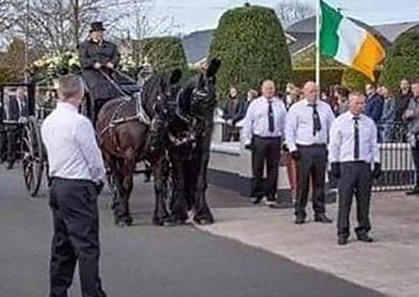 Parade before the burial of ex-Sinn Fein councillor Francie Mcnally in Ballinderry