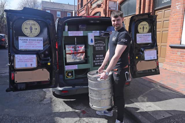 Bar Manager Richard Keenan loads a keg into his mobile beer delivery truck from the Hatfield bar delivery service in Belfast. (Photo: PA Wire)