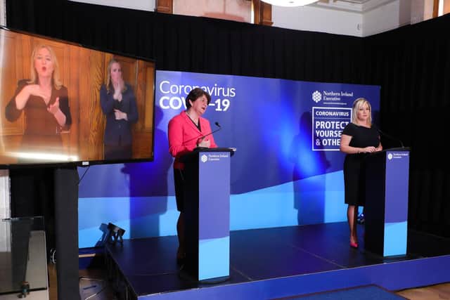First Minister, Arlene Foster (left) and deputy First Minister, Michelle O'Neill pictured during Thursday's daily Coronavirus briefing. (Photo: PA Wire)