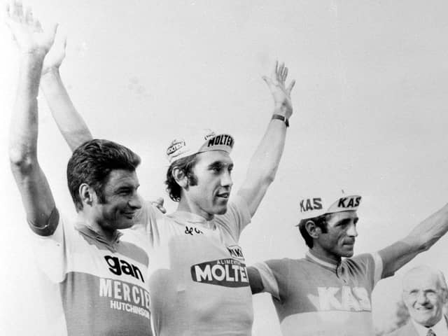 Eddy Merckx (centre) celebrates winning the 61st Tour de France ahead of Frenchman Raymond Poulidor (left) and Spain's Lopez Carril (right). Pic by PA.