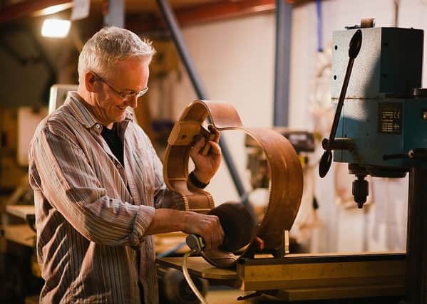 Guitar maker George Lowden at work