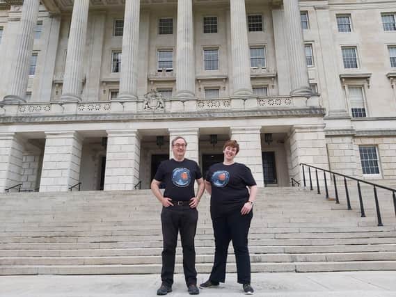 CAMRA NI's Bruce McFerran and Ruth Sloan outside Stormont