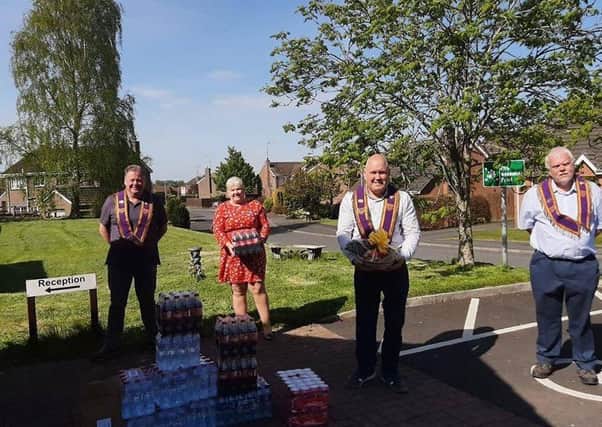 The Royal Arch Purple makes a donation of supplies to Sandringham Care Home in Portadown.