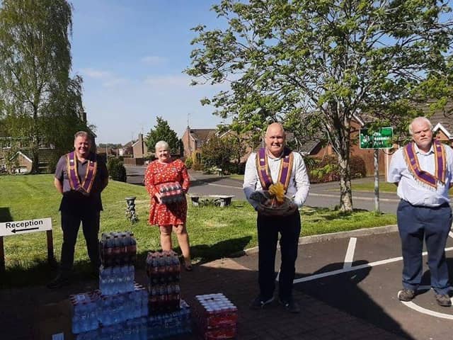 The Royal Arch Purple makes a donation of supplies to Sandringham Care Home in Portadown.