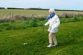 Maureen Lightbody plans to complete her daily walk in a nearby playing field