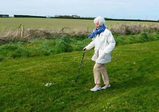 Maureen Lightbody plans to complete her daily walk in a nearby playing field