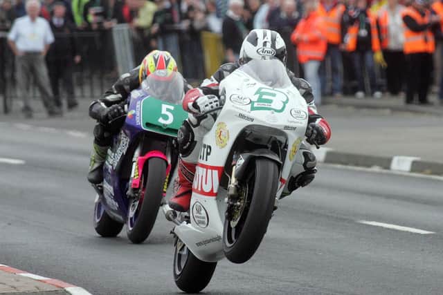 Michael Dunlop leads Christian Elkin in the 250cc race at the North West 200 in 2008.