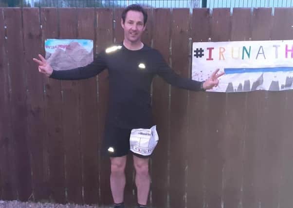 Geoff Smyth in the back garden of his Portadown home following a 12-hour charity challenge