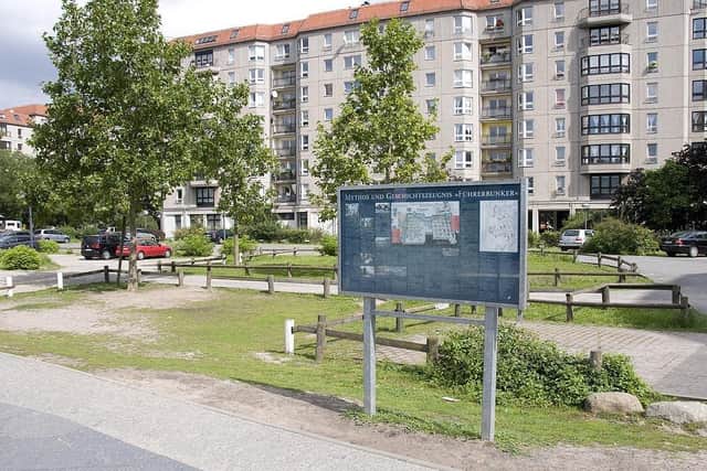 A plaque marks the site of Hitler’s bunker, now a parking lot, in the heart of Berlin. The Russians demolished most of the structure after the war