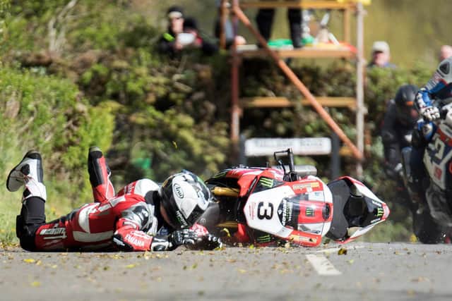 Ballymoney man Michael Dunlop crashed out of the lead of the Cookstown 100 Superbike race on the Milwaukee Yamaha, escaping unhurt.