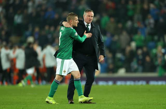 Michael O'Neill (right) with his Northern Ireland captain Steven Davis. Pic by PA.