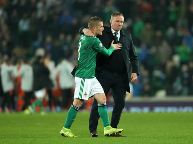 Michael O'Neill (right) with his Northern Ireland captain Steven Davis. Pic by PA.