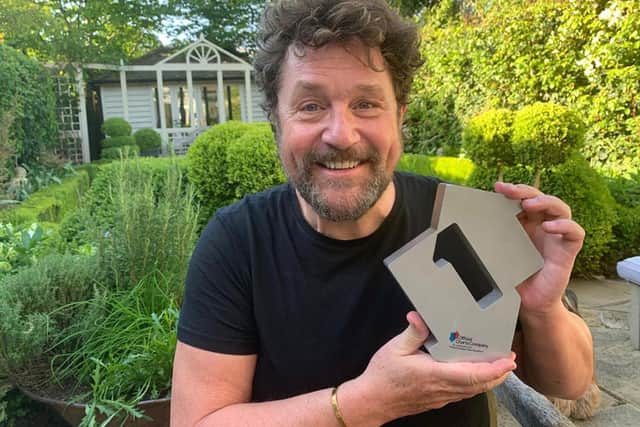 Michael Ball celebrating after reaching Number 1 in this week's Official Singles Chart with his rendition of You'll Never Walk Alone with Captain Tom Moore and The NHS Voices Of Care Choir