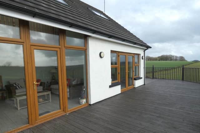 A view of the raised southerly facing external decked area