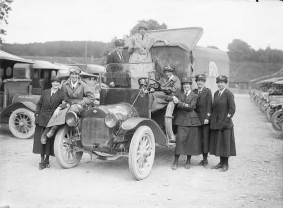VAD ambulance drivers with a Red Cross Ambulance in France 1917