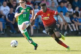 Michael Forbes in action against Manchester United at the SuperCupNI