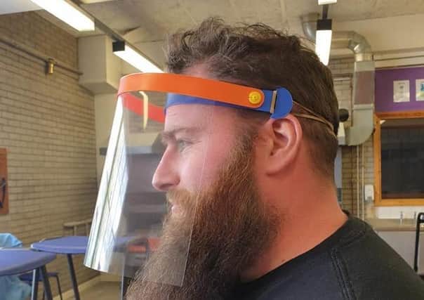 Teacher Daniel Cupples, from Carrickfegus Academy's Technology and Design department, sporting a visor.