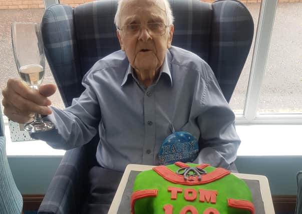 Tom Ferrett celebrates his 100th birthday on Thursday with a Glentoran cake