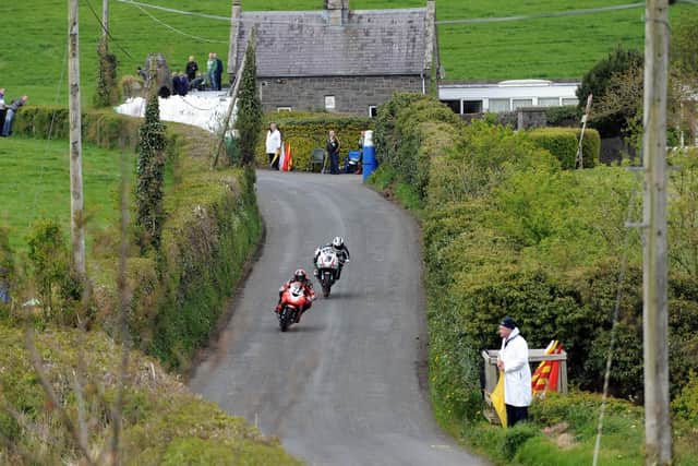 Irish road racing at its brilliant best as Ryan Farquhar leads Michael Dunlop along the narrow country roads at the Tandragee 100 eight years ago.