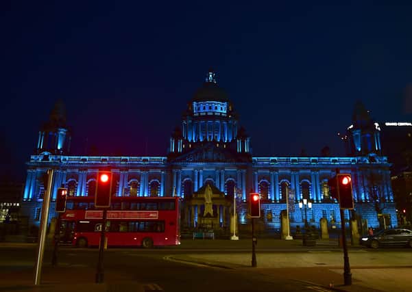 Belfast City Hall, lit up for the NHS above, will be illuminated on Friday to mark VE Day