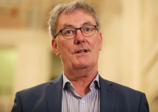 Mike Nesbitt speaking to the media in the great hall of Stormont Parliament buildings in Belfast