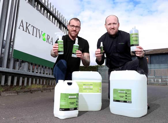 Aktivora NI Ltd directors Neal Connor (left) and Marty Chappell are pictured with the new sanitiser which is in demand from a growing list of clients including the governments of China, Russia and Canada