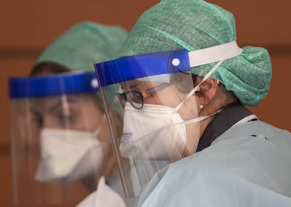 NHS staff in protective equipment.   (Photo by Justin Setterfield/Getty Images)