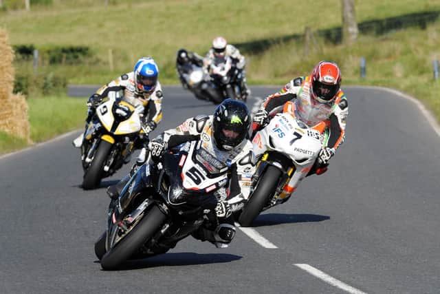 Bruce Anstey (Reltentless Suzuki), leads Ian Hutchinson (Padgett's Honda) and Keith Amor (KBMG BMW) at the Ulster Grand Prix in 2010.