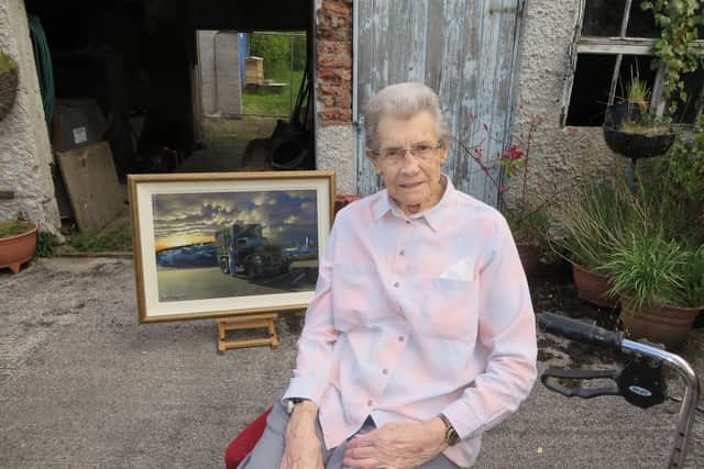 Rita Hamilton with her painting