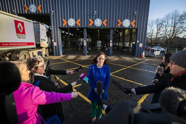 Infrastructure Minister Nichola Mallon speaking with media at the Balmoral MOT centre in Belfast.