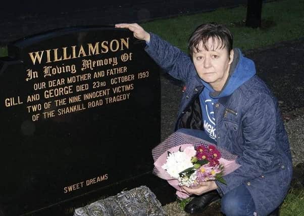 Michelle Williamson at the grave of her parents George and Gillian