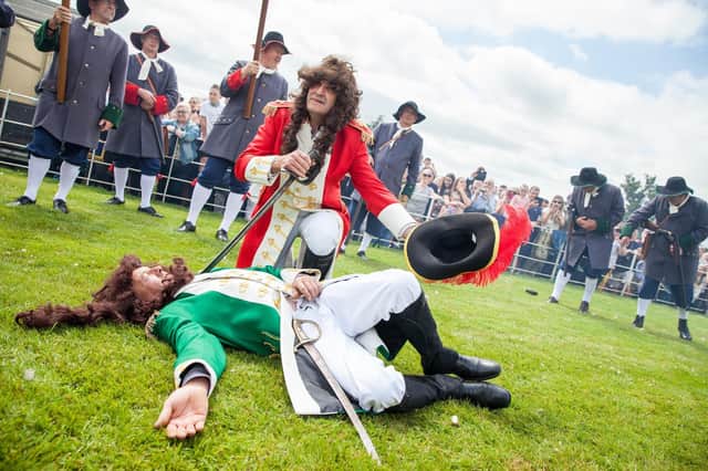 Tens of thousands of spectators traditionally flock to the Sham Fight in Scarva