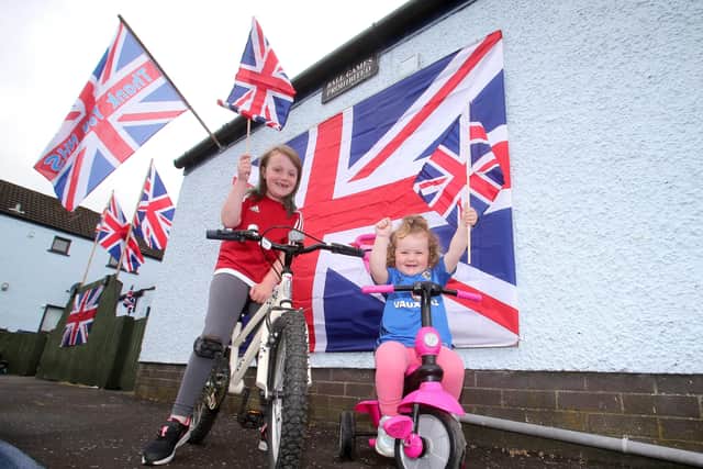 Bushmills, Northern Ireland. 8th May 2020..The Neill family prepare for their own VE Day celebrations at their home in Bushmills (Emma and Lucy Neill) .Pic Steven McAuley/McAuley Multimedia