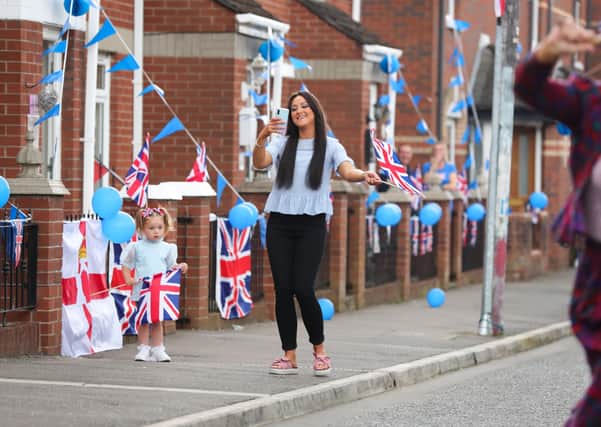 Press Eye - Belfast - Northern Ireland - 8th May 2020 -  

Residents from Leopold Street in the Woodvale area of North Belfast take part in street commemorations to mark the 75th anniversary of VE Day.

Photo by Kelvin Boyes / Press Eye.