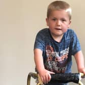 Undated family handout photo of Jayden Henderson, 8, from Norfolk, who has a neurological condition and hypertonia, a condition in which there is too much muscle tone so arms or legs, for example, are stiff and difficult to move and who will be walking laps at his home to raise money for the NHS