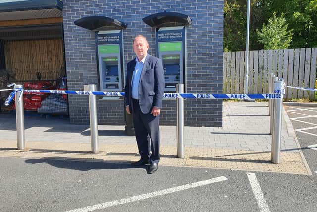 William Irwin MLA at the scene of this morning's robbery in Richhill