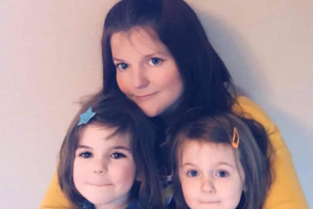 Mum, Clare, with daughters Bethany (right) and Hannah (left).