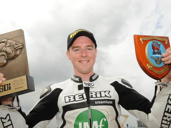 Alastair Seeley celebrates winning the Superstock race at the North West 200 in 2008.