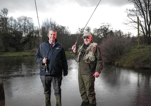 DAERA Minister Edwin Poots and Joe Stitt, member of the Professional Anglers Association of Game Angling Instructors Ireland (PAAGAI), launching the beginning of the angling season in March this year.  Photo: Brian Thomson