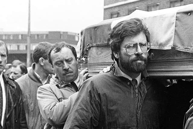 Gerry Adams carries the coffin at the 1988 funeral of IRA man Brendan Davison. Trevor Ringland says: "Even if we accept his claims that he was not in the IRA, Gerry Adams was at the forefront of a movement that was responsible for 60% of deaths and was pivotal in developing a toxic republican ideology"