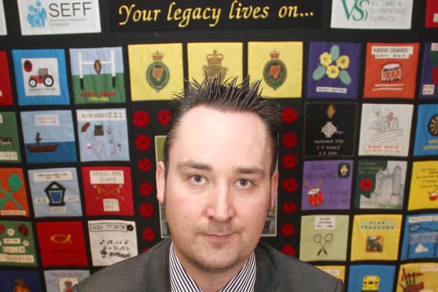 Kenny Donaldson is spokesman for Innocent Victims United, an umbrella group that represents victims of terrorism. He is pictured above in front of a quilt made by family members from Fermanagh who had loved ones murdered in the Troubles. 
Picture Colm O'Reilly Press Eye