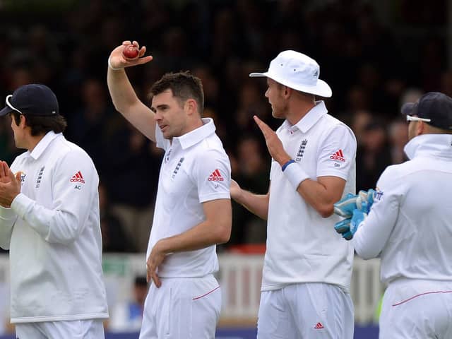 James Anderson holds the ball after taking his 300th test wicket, that of New Zealand's Peter Fulton