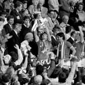 Kevin Ratcliffe, holds the trophy aloft after Everton's 2-0 victory over Watford