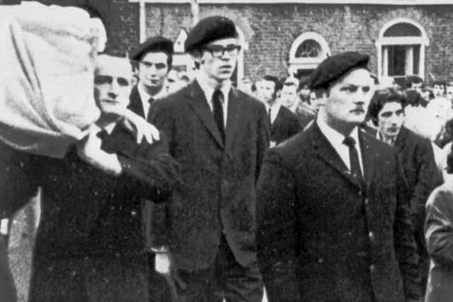 Gerry Adams in the 1970s at IRA funeral. Mr Adams's historic convictions have been overturned, after he was found by the Supreme Court to have been wrongly interned