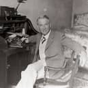 Poet Robert W. Service at his Desk Long after he left the Yukon