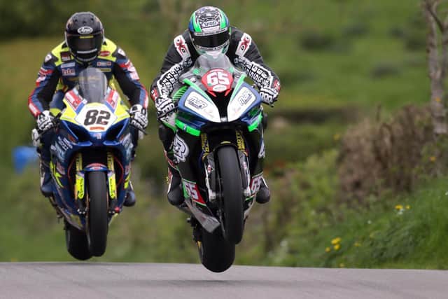 Michael Sweeney and Derek Sheils in action during practice at the Cookstown 100 last year.