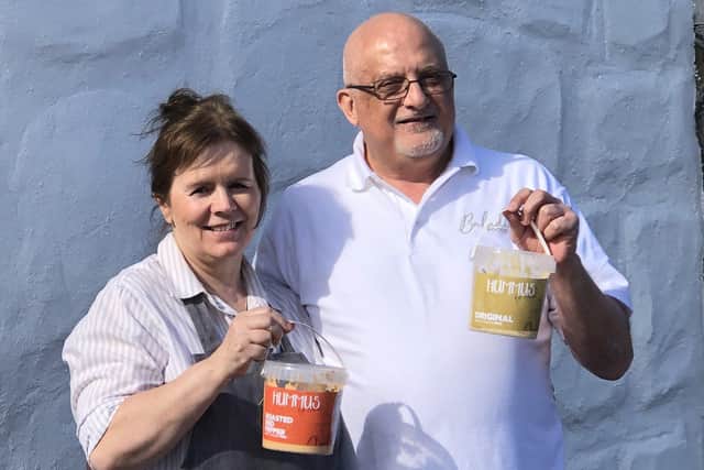 Hani and wife Sandra, originally from Carrick pictured at The Dairy Deli outside Larne
